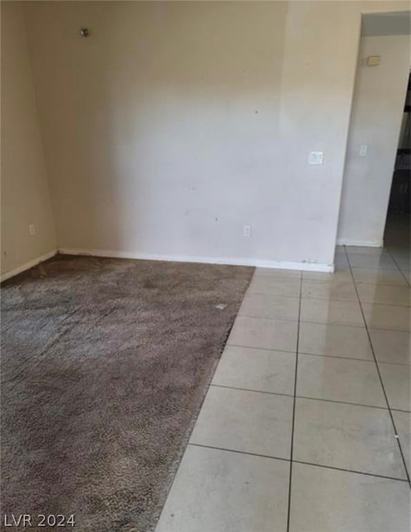 view of tiled spare room