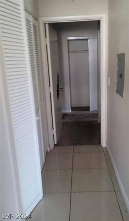 corridor featuring tile flooring