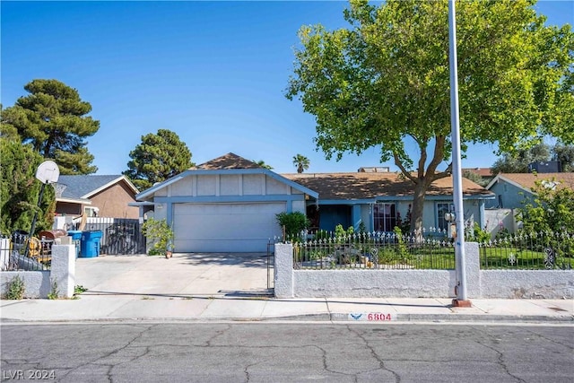 ranch-style house featuring a garage