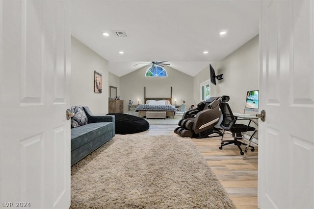 bedroom featuring wood-type flooring and vaulted ceiling