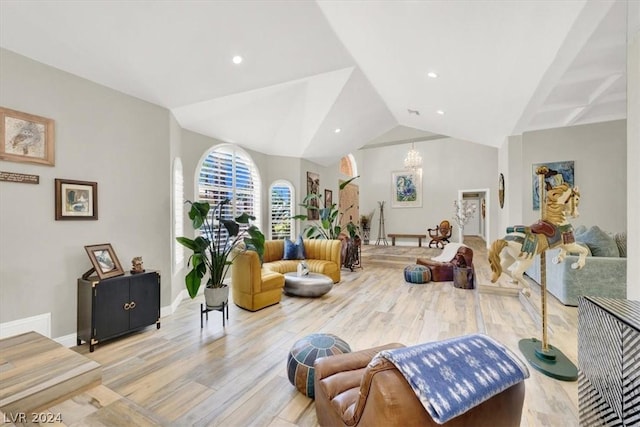 interior space featuring vaulted ceiling and light hardwood / wood-style floors