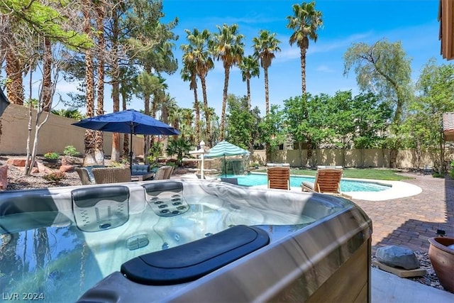 view of patio featuring a hot tub