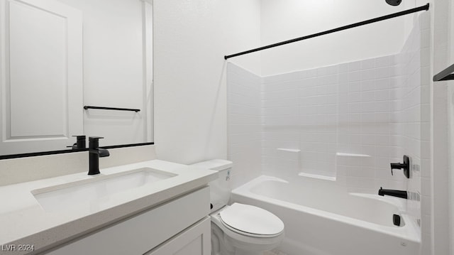 full bathroom featuring shower / bath combination, vanity, and toilet