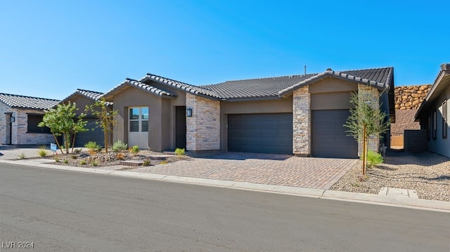 view of front of property featuring a garage