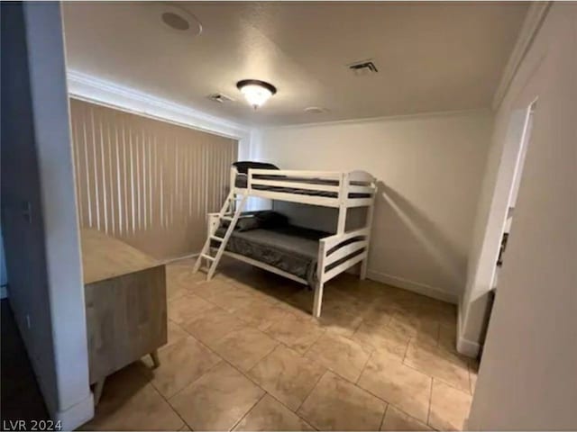 bedroom with crown molding