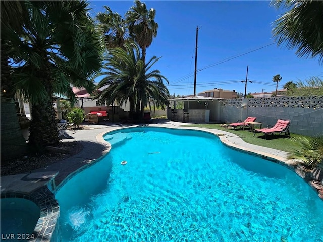 view of pool featuring a patio area