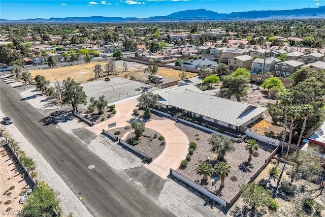 birds eye view of property featuring a mountain view