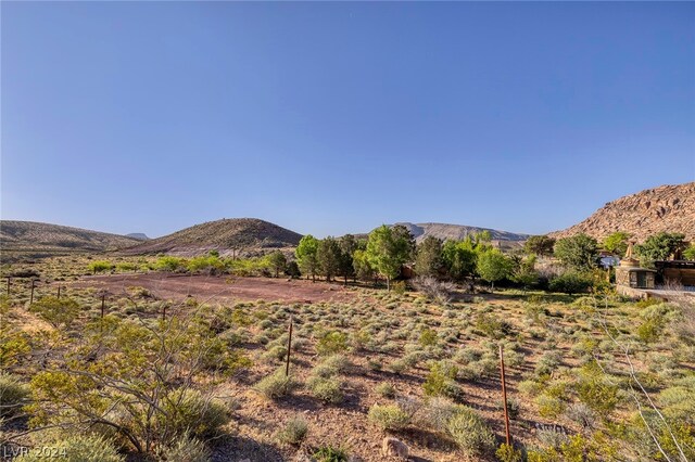 property view of mountains featuring a rural view