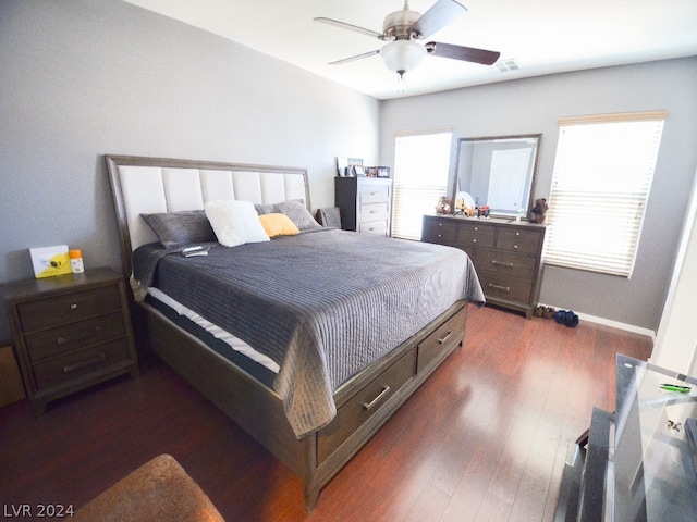 bedroom featuring dark wood-type flooring and ceiling fan