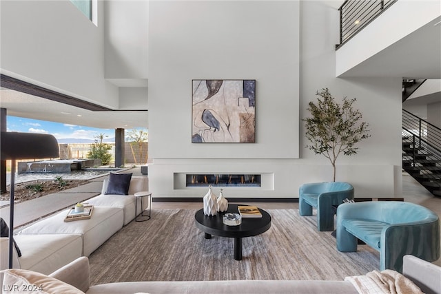 living room with a high ceiling