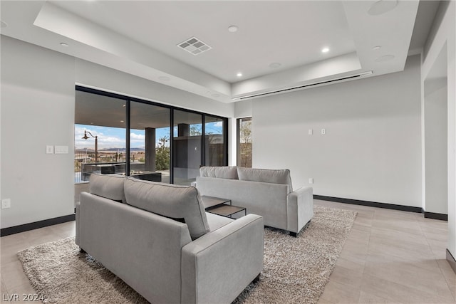 living room with light tile patterned floors