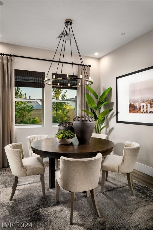 dining area featuring hardwood / wood-style flooring