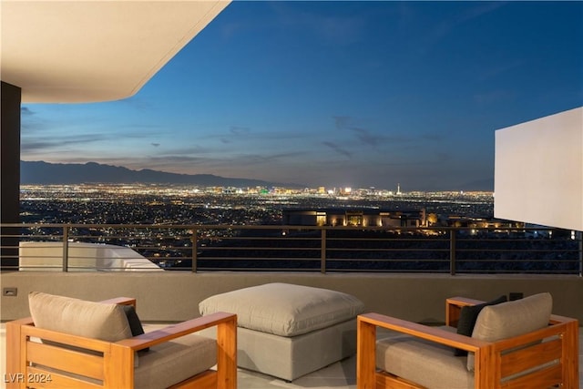 balcony at dusk with a mountain view