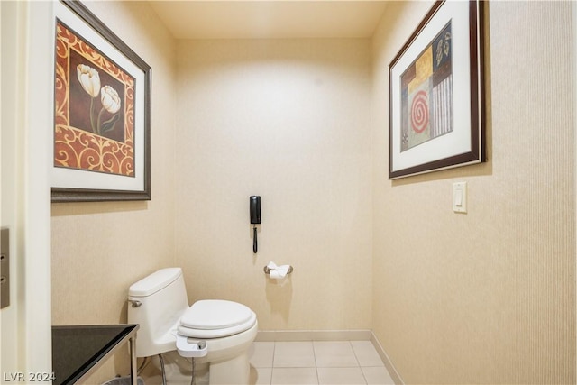 bathroom featuring toilet and tile patterned floors