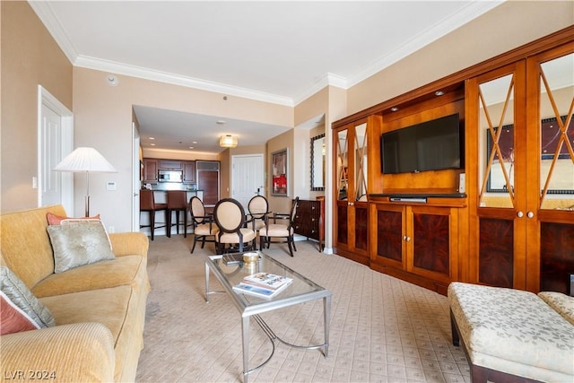 living room featuring crown molding