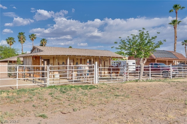 view of horse barn featuring an outdoor structure