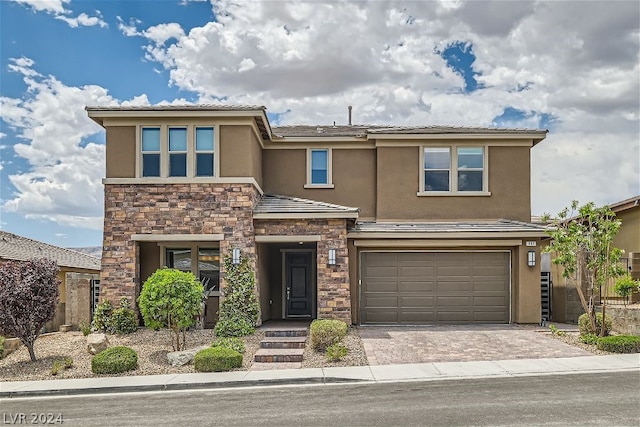 view of front of home featuring a garage