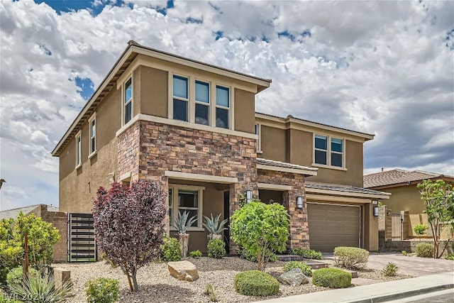 view of front of home with a garage