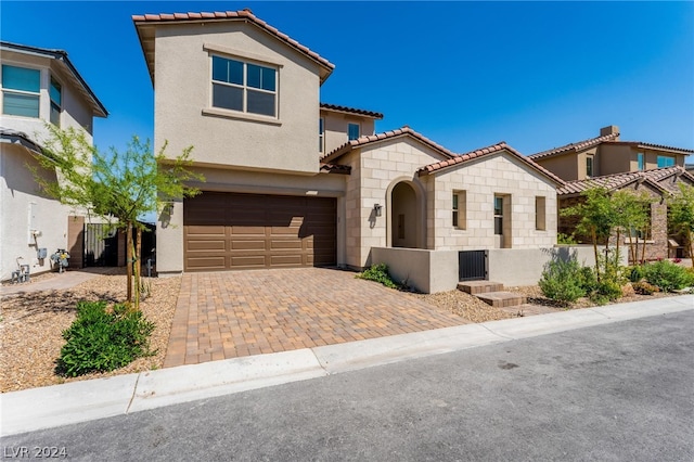 view of front of property with a garage