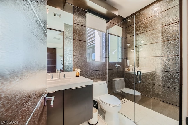 bathroom featuring an enclosed shower, tile walls, tile floors, toilet, and vanity