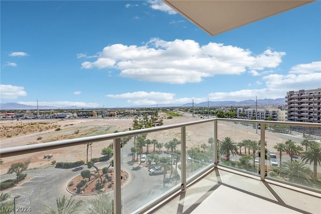 balcony featuring a mountain view