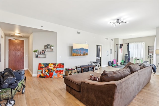 living room with light hardwood / wood-style floors