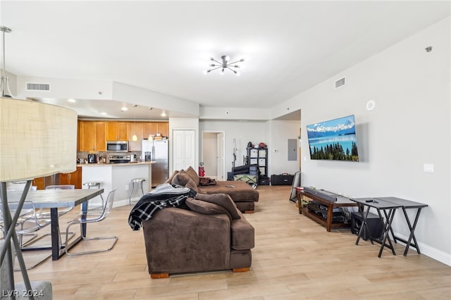 living room with light hardwood / wood-style floors