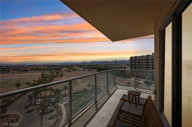 view of balcony at dusk