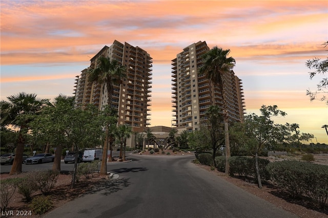 view of outdoor building at dusk