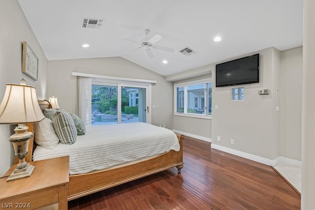 bedroom featuring hardwood / wood-style flooring, lofted ceiling, ceiling fan, and access to exterior