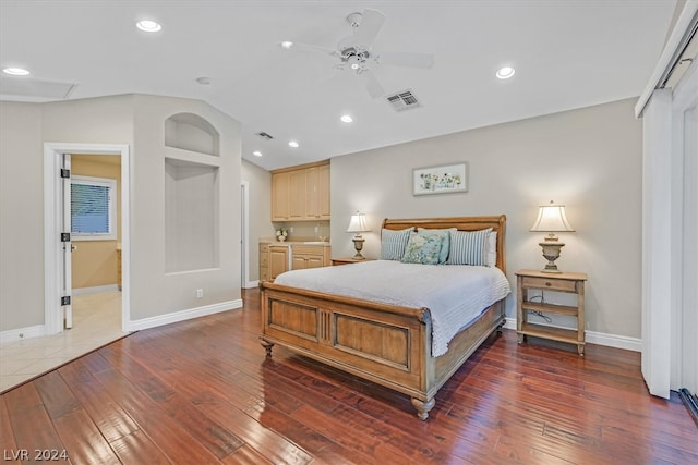 bedroom with tile floors, ceiling fan, and lofted ceiling