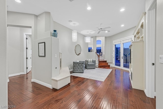 interior space featuring hardwood / wood-style floors and ceiling fan