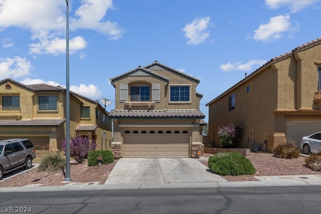 view of front of home with a garage