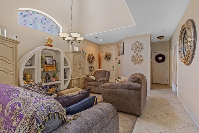 living room featuring a notable chandelier and light tile floors