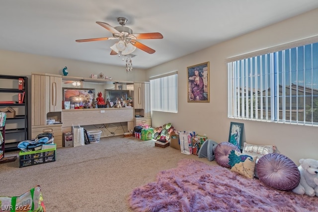 game room featuring ceiling fan and carpet floors