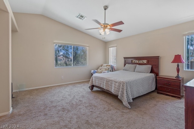 bedroom featuring carpet flooring, ceiling fan, and vaulted ceiling