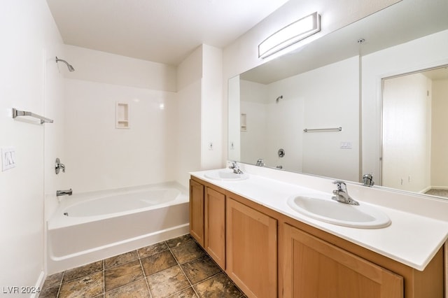 bathroom with vanity and tub / shower combination