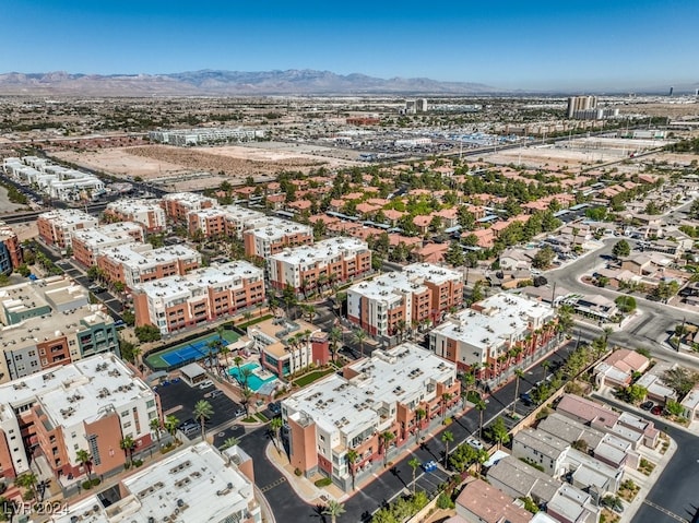 drone / aerial view featuring a mountain view