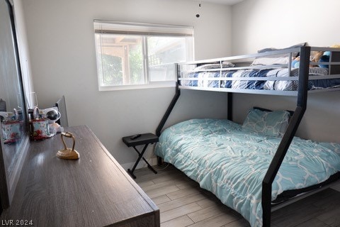 bedroom featuring hardwood / wood-style flooring