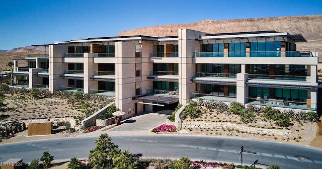 view of building exterior with a mountain view