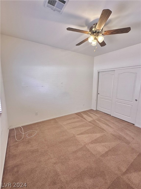 interior space featuring ceiling fan