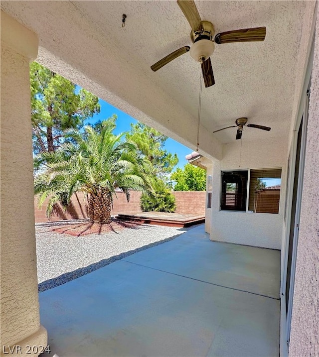 view of patio / terrace featuring ceiling fan