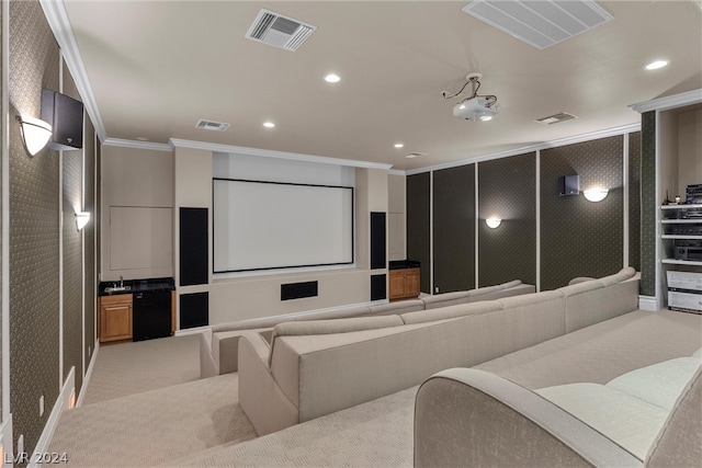 carpeted home theater with crown molding