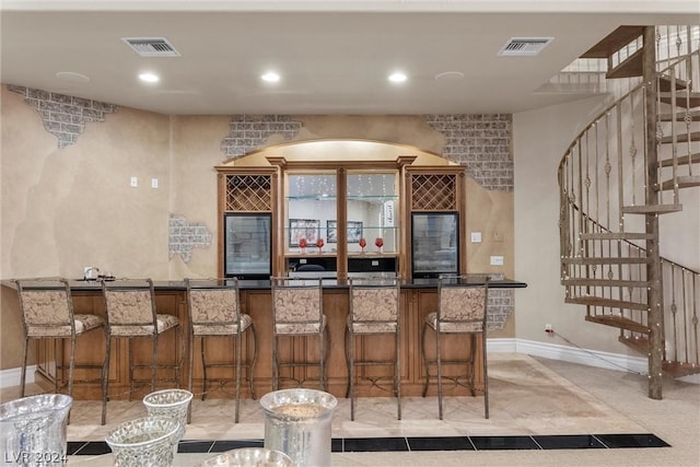 2785 S Monte Cristo Way, Las Vegas, NV 89117 - bar area featuring stairs, baseboards, recessed lighting, and wine cooler