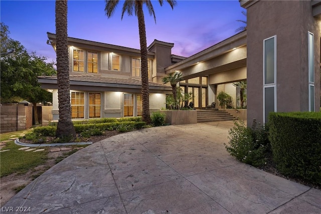 2785 S Monte Cristo Way, Las Vegas, NV 89117 - view of front of property with stucco siding and a patio area