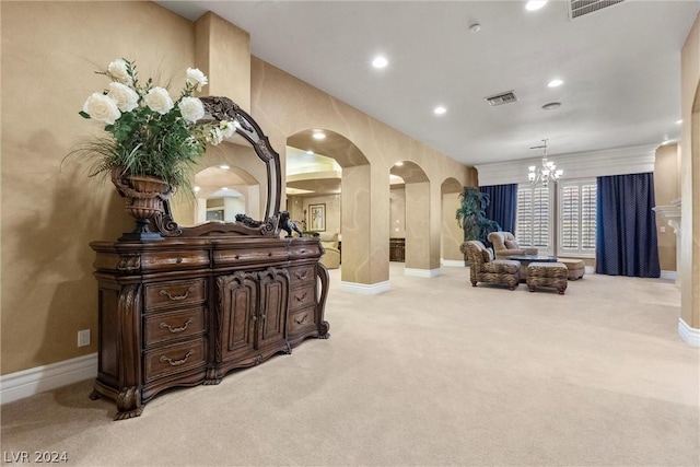 2785 S Monte Cristo Way, Las Vegas, NV 89117 - living area with arched walkways, carpet, a chandelier, baseboards, and recessed lighting