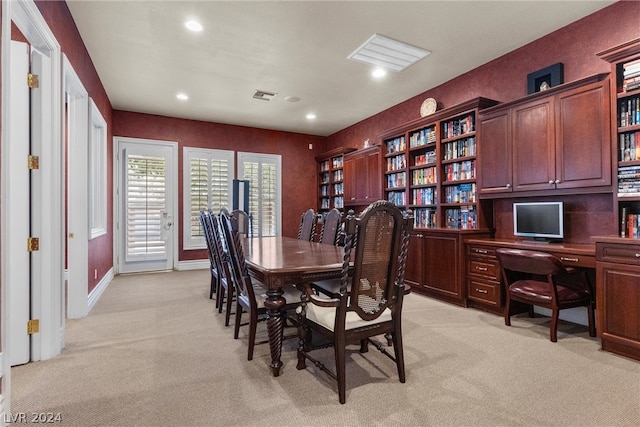 view of carpeted dining space