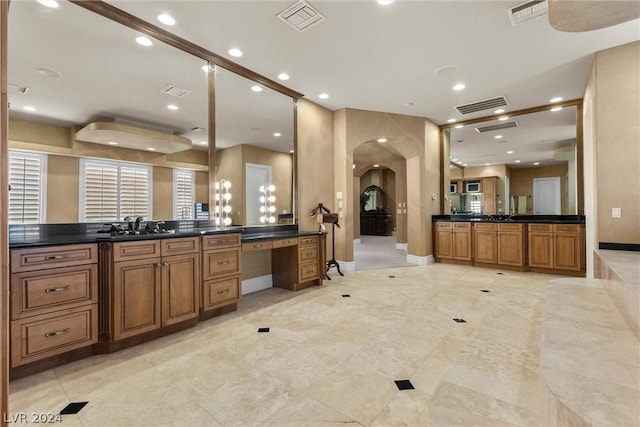 2785 S Monte Cristo Way, Las Vegas, NV 89117 - full bathroom featuring baseboards, two vanities, and recessed lighting