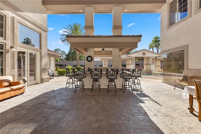 view of patio / terrace with exterior bar