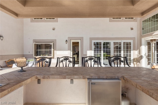 view of patio / terrace featuring french doors